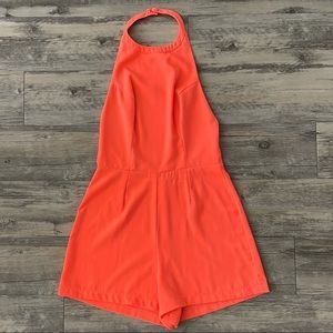 Bright Orange High Neck/Low Back Romper from LF